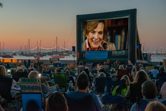 Dr. Sylvia Earle on this big screen with the Newport Bridge in the background. Photo by J. Clancy Photography