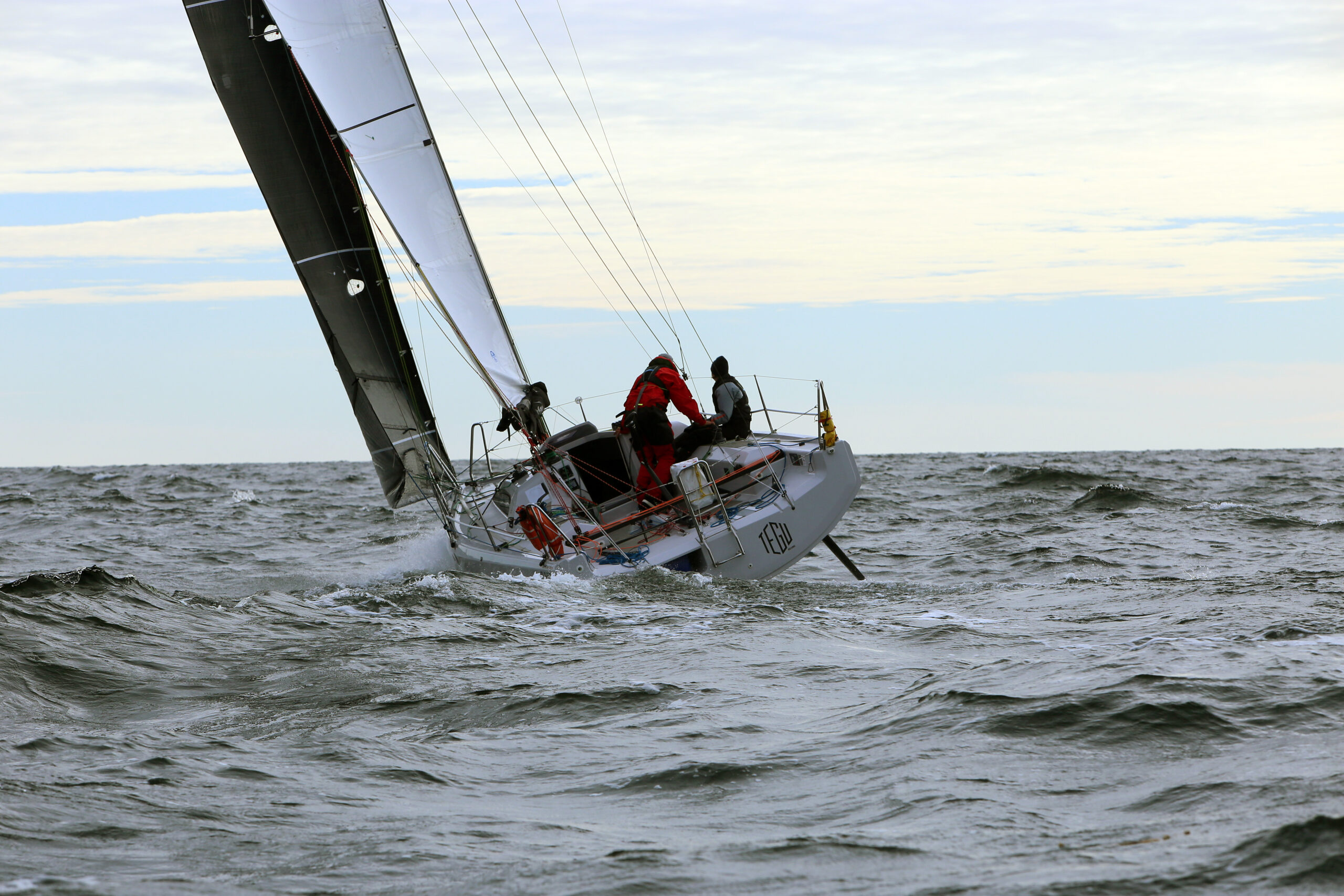 Distance shot of Noora and her crewmate sailing on a nice day on the Baltic Sea. 