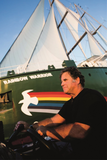 Captain Peter Willcox of Greenpeace with the Rainbow Warrior.