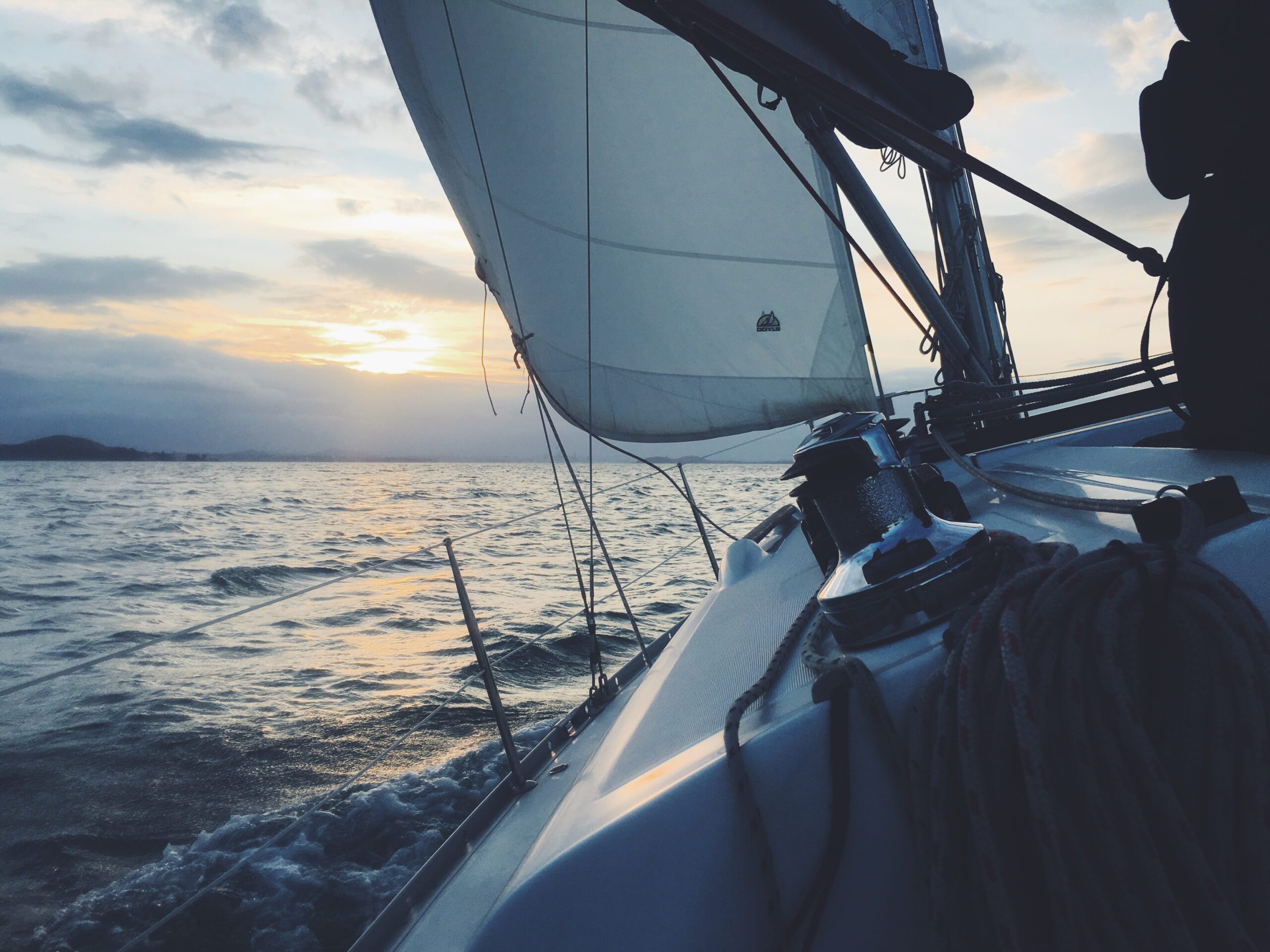 Sailing into the sunset. sailboat